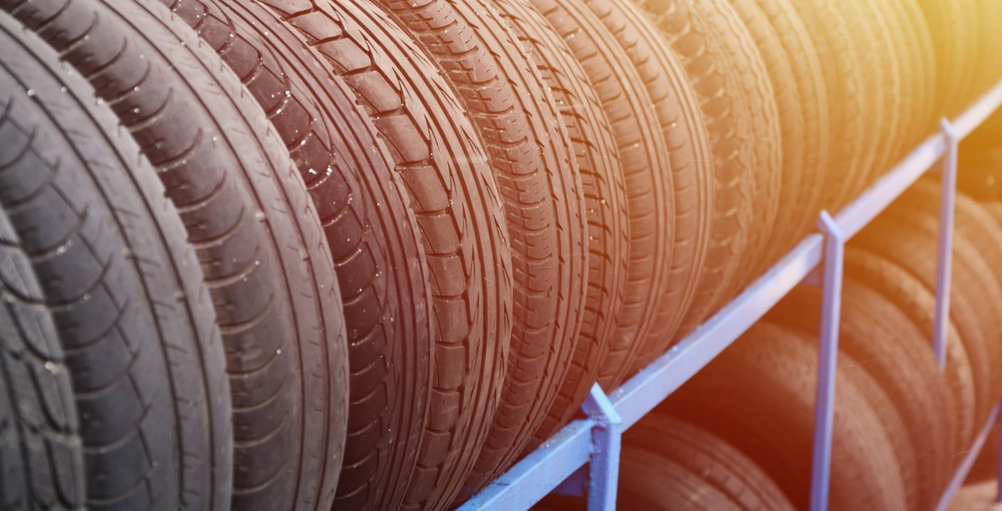 Rack with variety of car tires in automobile store-blog-page-post-the-wheel-collection