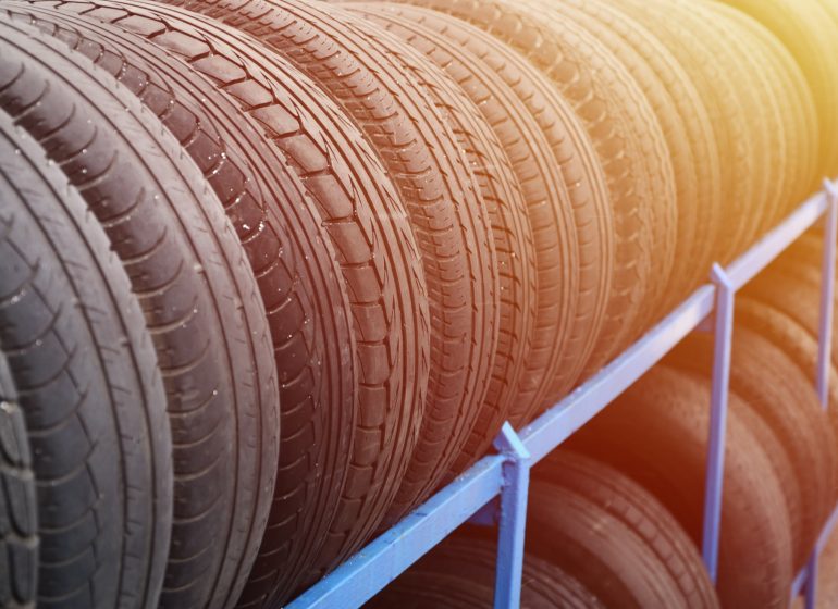 Rack with variety of car tires in automobile store-blog-page-post-the-wheel-collection