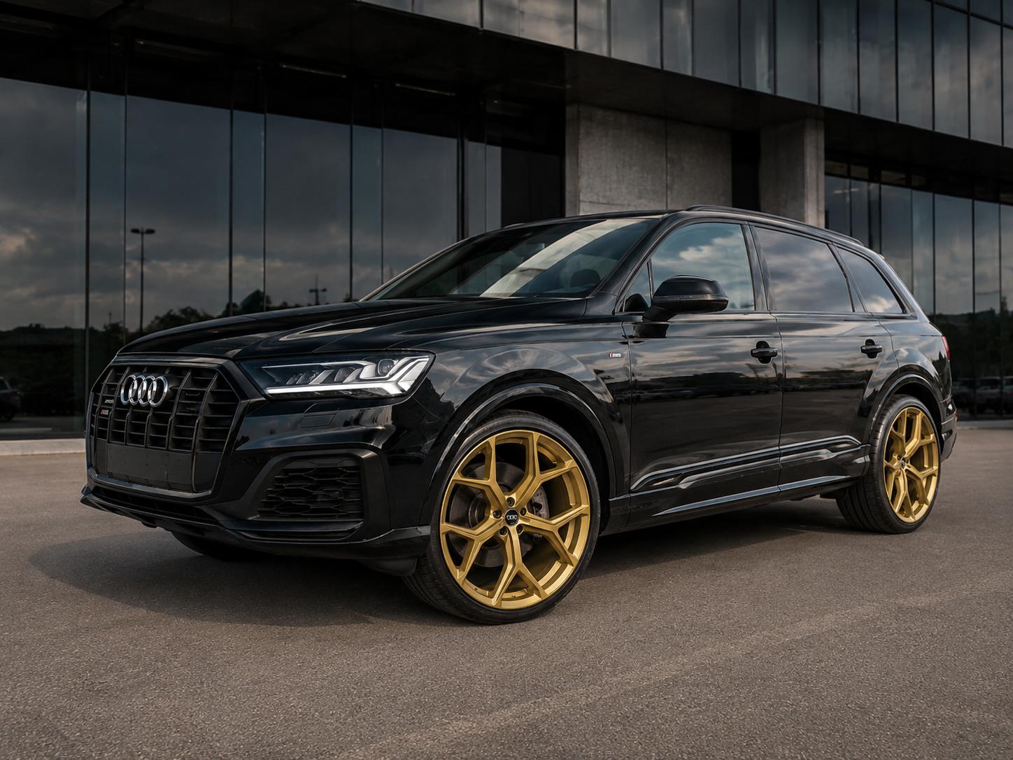 22 inch Limited Edition Bronze-Gold Audi alloy wheels fitted to a black Audi Q7, suitable for Audi Q5, Q7, Q8, RS6 and RS7 models